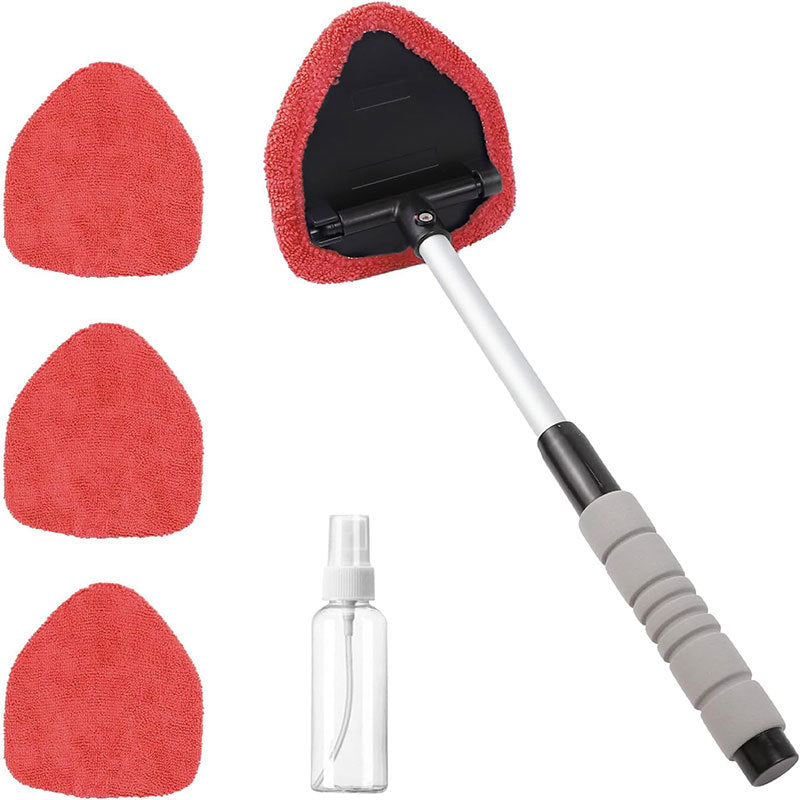 Car window cleaning tool set with squeegee, microfiber cloths, and spray bottle on a white background