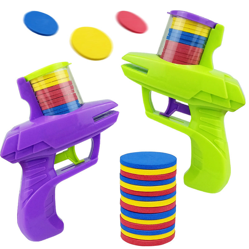 Colorful toy disc launchers with discs on a white background