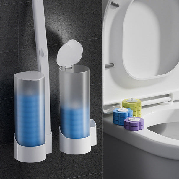 Toilet cleaning brush set with cleaning solution and toilet in the background