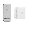 Remote control and light switch remote on a white background.