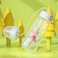 Clear water bottle with pink deer pattern on a green background with yellow tree-like structures